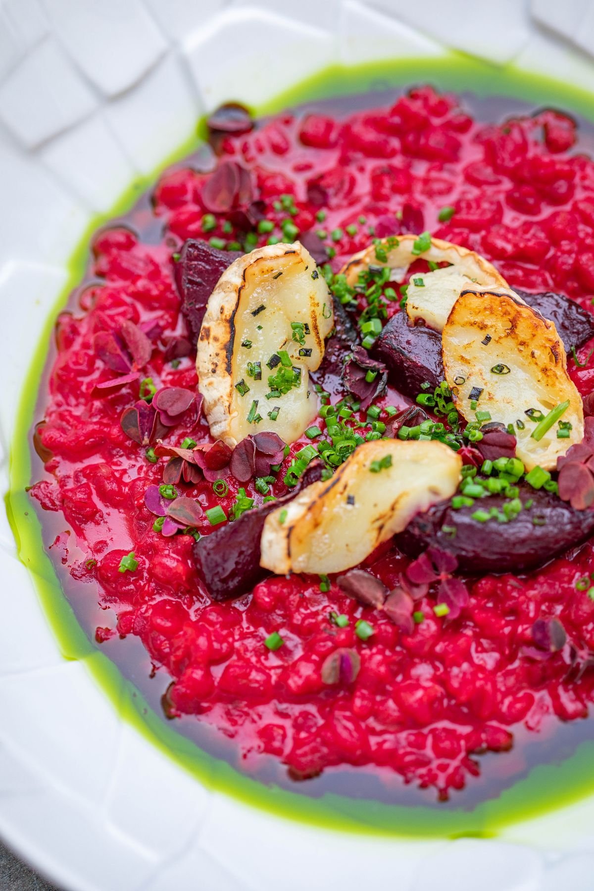 Beetroot risotto with cheese and fresh herbs
