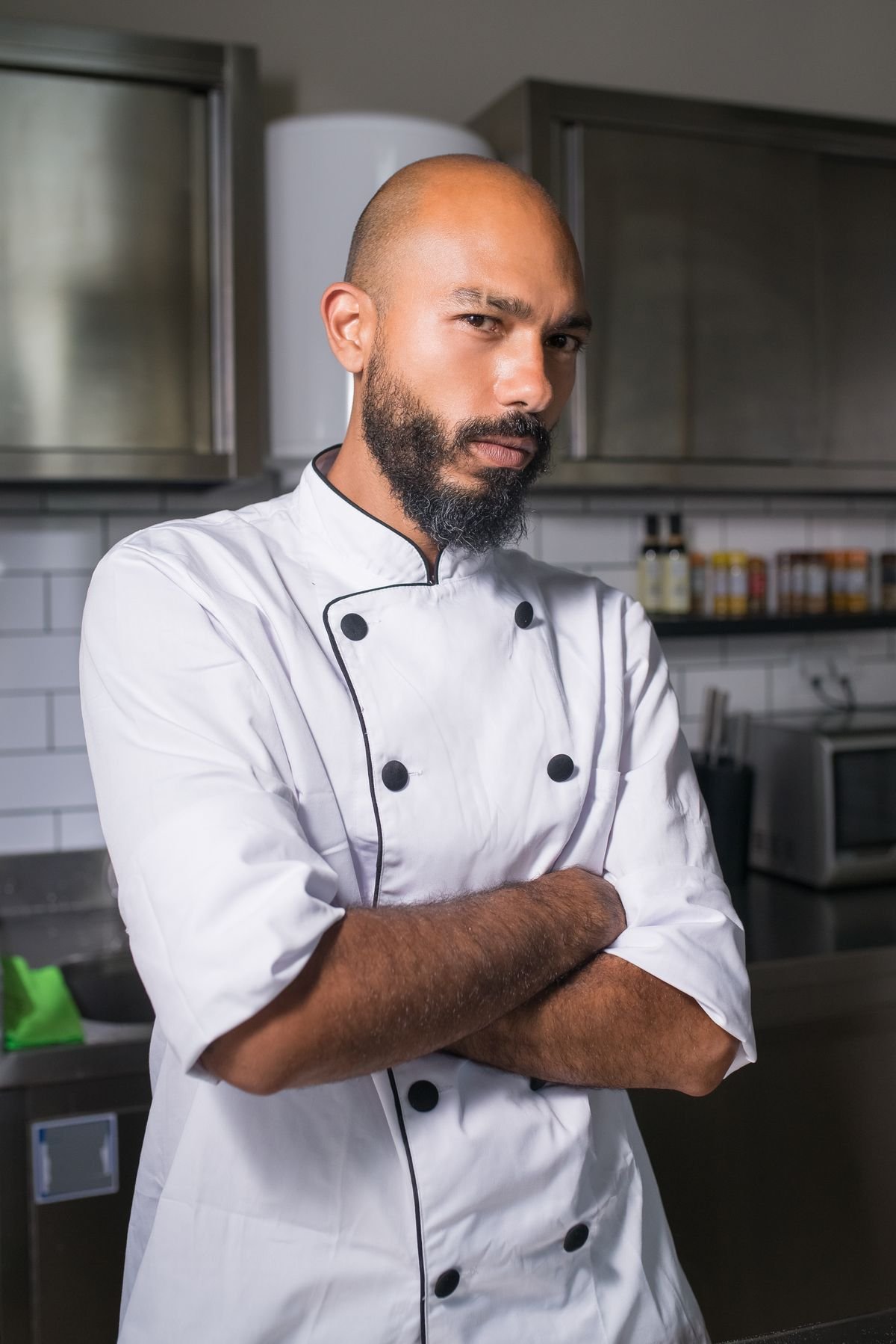 Stock portrait of a chef in a restaurant kitchen