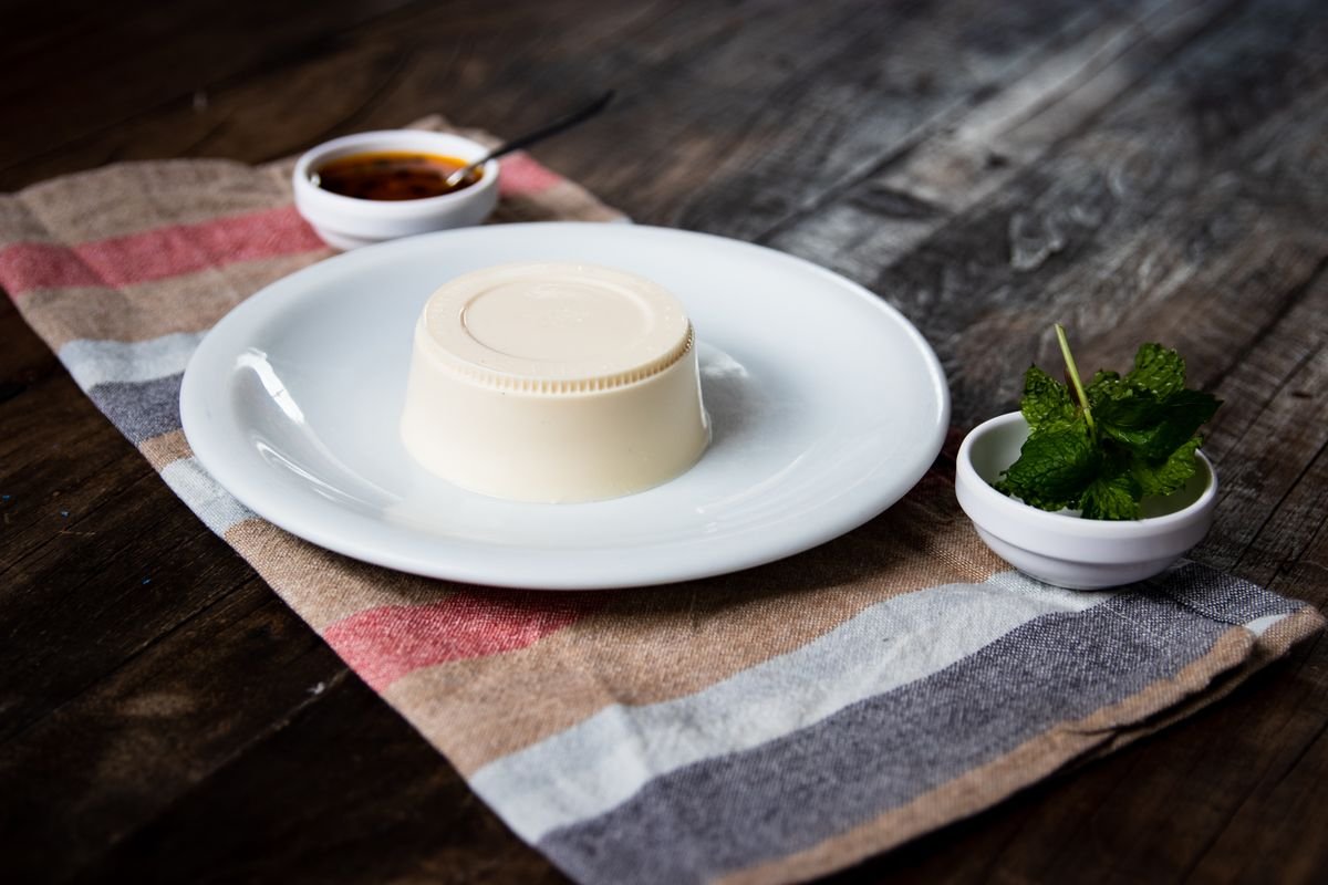Panna cotta with mint and fruit sauce